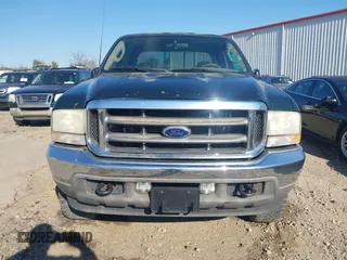2003 Ford Super Duty F-250 XL with VIN 1FTNW21S23EA08088, listed as a IAAI auction lot 41671180 with 250,765 mi miles. Bid and sale history available at carsss.com. Image 12.
