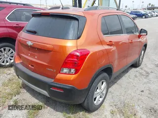 2015 Chevrolet Trax LT with VIN KL7CJLSB1FB099920, listed as a IAAI auction lot 42045665 with 112,198 mi miles. Bid and sale history available at carsss.com. Image 4.