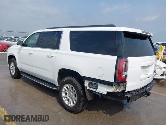 2019 GMC Yukon XL SLT with VIN 1GKS2GKC4KR160002, listed as a IAAI auction lot 42125427 with 119,312 mi miles and . Bid and sale history available at DreamBid. Image 3.