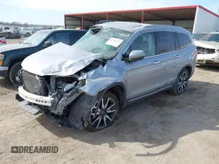 2021 Honda Pilot Elite with VIN 5FNYF6H00MB085678, listed as a IAAI auction lot 41783075 with Not Provided miles and . Bid and sale history available at DreamBid. Image 17.