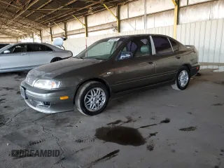 2001 Infiniti G20 Luxury z VIN JNKCP11A11T403098, wystawiony jako Copart lot #53855605 z przebiegiem 187 656 mil mil oraz Szkoda całkowita • Salvage title. Historia ofert i sprzedaży dostępna na DreamBid. Obrazek 1.