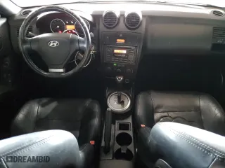 2003 Hyundai Tiburon GT with VIN KMHHN65F53U086483, listed as a Copart auction lot 53391495 with 153,544 mi miles and Salvage Title. Bid and sale history available at carsss.com. Image 8.
