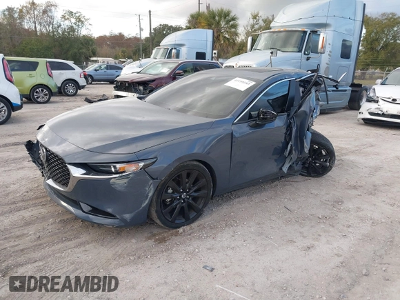 2022 Mazda 3 Carbon Edition z VIN JM1BPACL2N1509492, wystawiony jako IAAI lot #41198183 z przebiegiem Nie podano mil oraz . Historia ofert i sprzedaży dostępna na DreamBid. Obrazek 2.
