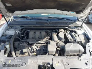 2015 Ford Taurus Limited with VIN 1FAHP2F80FG144421, listed as a IAAI auction lot 41947787 with 143,496 mi miles. Bid and sale history available at carsss.com. Image 10.