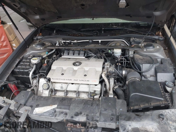 1999 Cadillac Eldorado ESC z VIN 1G6EL12Y8XU612393, wystawiony jako IAAI lot #41761839 z przebiegiem 104 994 mil mil oraz . Historia ofert i sprzedaży dostępna na DreamBid. Obrazek 10.