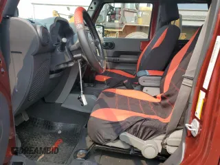 2007 Jeep Wrangler Unlimited X z VIN 1J4GA391X7L169728, wystawiony jako Copart lot #59484265 z przebiegiem 165 674 mil mil oraz Szkoda całkowita • Salvage title. Historia ofert i sprzedaży dostępna na DreamBid. Obrazek 7.