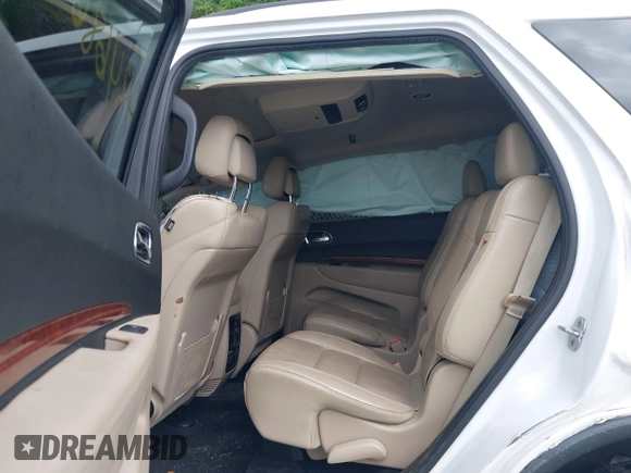 2013 Dodge Durango Citadel with VIN 1C4RDJEGXDC559700, listed as a IAAI auction lot 42468665 with 138,967 mi miles and . Bid and sale history available at DreamBid. Image 8.
