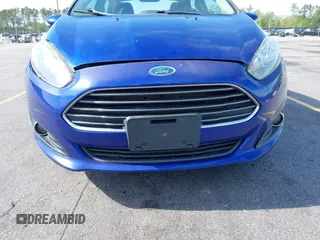 2014 Ford Fiesta SE with VIN 3FADP4BJ5EM190009, listed as a IAAI auction lot 42036976 with 157,575 mi miles. Bid and sale history available at carsss.com. Image 6.