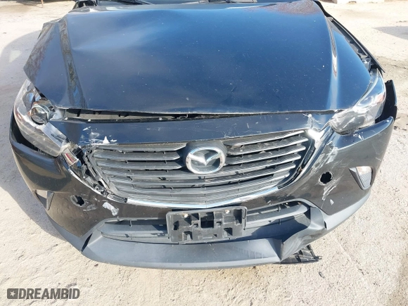 2016 Mazda CX-3 Sport with VIN JM1DKBB75G0124907, listed as a IAAI auction lot 42107232 with 128,411 mi miles. Bid and sale history available at carsss.com. Image 6.