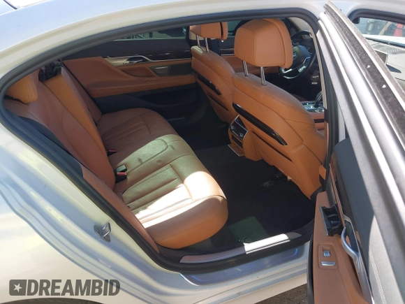2020 BMW 7 Series 740i with VIN WBA7T2C0XLGL17774, listed as a IAAI auction lot 42278067 with 100,465 mi miles and . Bid and sale history available at DreamBid. Image 8.