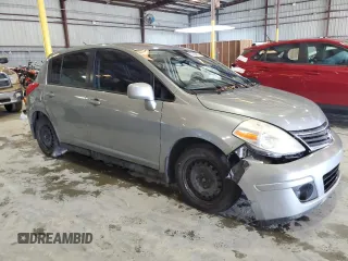 2012 Nissan Versa S with VIN 3N1BC1CP3CK202541, listed as a Copart auction lot 70234934 with 214,607 mi miles and Salvage Title. Bid and sale history available at carsss.com. Image 4.