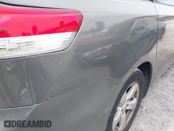 2014 Toyota Sienna L with VIN 5TDZK3DC6ES421278, listed as a IAAI auction lot 41178679 with 202,823 mi miles. Bid and sale history available at carsss.com. Image 21.