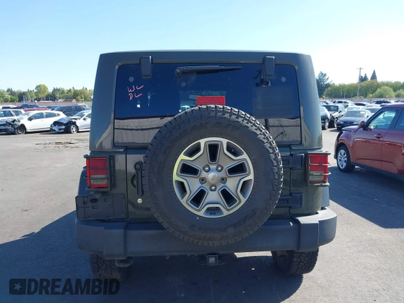 2015 Jeep Wrangler Rubicon Hard Rock with VIN 1C4BJWCGXFL771669, listed as a IAAI auction lot 42057423 with 36,996 mi miles and . Bid and sale history available at DreamBid. Image 17.