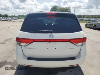 2017 Honda Odyssey Touring z VIN 5FNRL5H99HB007993, wystawiony jako Copart lot #60501805 z przebiegiem 104 628 mil mil oraz Szkoda całkowita • Salvage title. Historia ofert i sprzedaży dostępna na DreamBid. Obrazek 6.