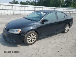 2012 Volkswagen Jetta SE with VIN 3VWBP7AJ6CM076714, listed as a Copart auction lot 59402895 with 175,364 mi miles and Salvage title. Bid and sale history available at DreamBid. Image 1.
