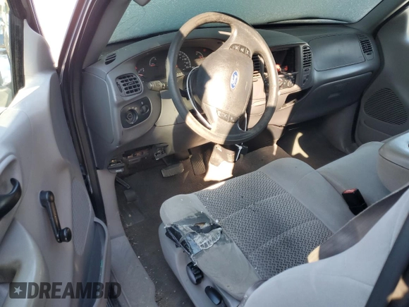 2003 Ford F-150 XL with VIN 1FTRX17263NA82310, listed as a Copart auction lot 76577354 with Not provided miles and Salvage title. Bid and sale history available at DreamBid. Image 8.