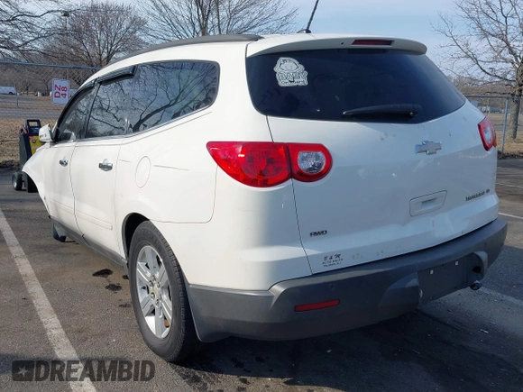 2012 Chevrolet Traverse 1LT z VIN 1GNKVGED7CJ108488, wystawiony jako IAAI lot #41779819 z przebiegiem 121 396 mil mil oraz . Historia ofert i sprzedaży dostępna na DreamBid. Obrazek 3.
