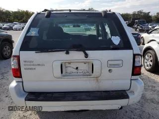 2002 Isuzu Rodeo S z VIN 4S2CK58W424342189, wystawiony jako Copart lot #76187294 z przebiegiem 139 827 mil mil oraz Szkody całkowita. Historia ofert i sprzedaży dostępna na DreamBid. Obrazek 6.