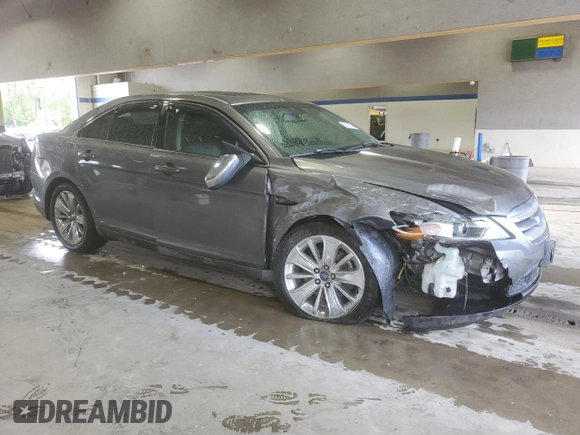 2012 Ford Taurus Limited with VIN 1FAHP2FW3CG113920, listed as a Copart auction lot 55565615 with 131,981 mi miles and Salvage title. Bid and sale history available at DreamBid. Image 4.