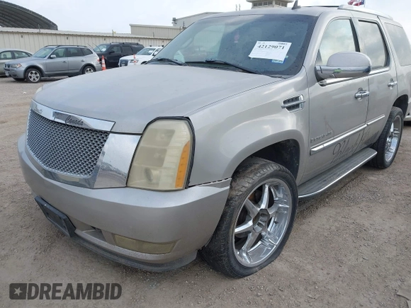 2007 Cadillac Escalade z VIN 1GYFK63827R379883, wystawiony jako IAAI lot #42129071 z przebiegiem 227 794 mil mil oraz . Historia ofert i sprzedaży dostępna na DreamBid. Obrazek 6.