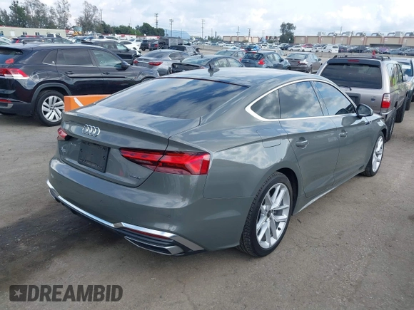 2023 Audi A5 Sportback S line Premium Plus with VIN WAUFACF50PA040074, listed as a IAAI auction lot 41933197 with 21,871 mi miles and . Bid and sale history available at DreamBid. Image 4.