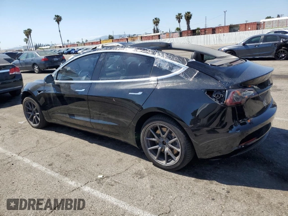 2019 Tesla Model 3 Mid Range z VIN 5YJ3E1EA8KF306096, wystawiony jako Copart lot #54790755 z przebiegiem 170 775 mil mil oraz Szkody całkowita. Historia ofert i sprzedaży dostępna na DreamBid. Obrazek 2.