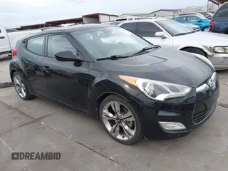2013 Hyundai Veloster w/Black Int z VIN KMHTC6AD7DU152800, wystawiony jako IAAI lot #42477655 z przebiegiem 93 169 mil mil oraz . Historia ofert i sprzedaży dostępna na DreamBid. Obrazek 1.