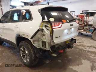 2019 Jeep Cherokee Trailhawk with VIN 1C4PJMBX4KD390061, listed as a IAAI auction lot 42007112 with 72,227 mi miles and . Bid and sale history available at DreamBid. Image 6.