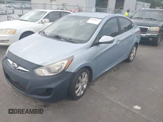 2013 Hyundai Accent GLS with VIN KMHCU4AE8DU583303, listed as a IAAI auction lot 42504235 with 113,992 mi miles and . Bid and sale history available at DreamBid. Image 2.