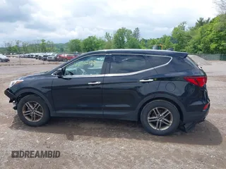2017 Hyundai Santa Fe 2.4L z VIN 5XYZTDLBXHG431230, wystawiony jako IAAI lot #42302492 z przebiegiem 185 291 mil mil oraz . Historia ofert i sprzedaży dostępna na DreamBid. Obrazek 14.