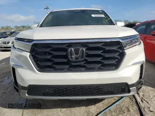 2023 Honda Pilot EX-L 8 Passenger with VIN 5FNYG2H48PB012667, listed as a Copart auction lot 76496054 with 0 mi miles and Non Repairable. Bid and sale history available at carsss.com. Image 5.