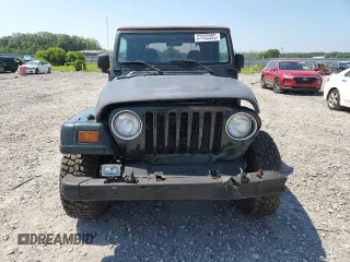 1997 Jeep Wrangler Sahara with VIN 1J4FY49S3VP519387, listed as a Copart auction lot 63822395 with 187,884 mi miles and Salvage title. Bid and sale history available at DreamBid. Image 5.