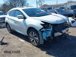 2019 Nissan Murano Platinum with VIN 5N1AZ2MJ1KN126085, listed as a IAAI auction lot 41585765 with 112,496 mi miles and . Bid and sale history available at DreamBid. Image 1.