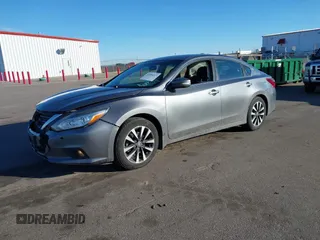 2016 Nissan Altima SV with VIN 1N4AL3AP9GC167612, listed as a IAAI auction lot 41694227 with 102,460 mi miles and . Bid and sale history available at DreamBid. Image 2.