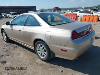 2001 Honda Accord EX with VIN 1HGCG22541A033075, listed as a IAAI auction lot 40200453 with 121,275 mi miles and . Bid and sale history available at DreamBid. Image 3.
