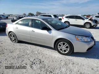 2005 Pontiac G6 with VIN 1G2ZG528154129534, listed as a Copart auction lot 44682694 with 74,338 mi miles and Salvage Title. Bid and sale history available at carsss.com. Image 4.