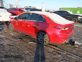 2020 Toyota Corolla SE with VIN JTDS4RCEXLJ014799, listed as a IAAI auction lot 41322672 with 83,984 mi miles. Bid and sale history available at carsss.com. Image 3.