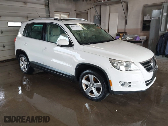 2010 Volkswagen Tiguan SEL with VIN WVGAV7AX6AW514729, listed as a IAAI auction lot 42433993 with 185,980 mi miles and . Bid and sale history available at DreamBid. Image 1.