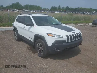 2017 Jeep Cherokee Trailhawk with VIN 1C4PJMBS9HW500121, listed as a IAAI auction lot 42352077 with 118,773 mi miles and . Bid and sale history available at DreamBid. Image 1.