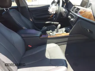 2014 BMW 3 Series 328i with VIN WBA3A5G55ENP31569, listed as a IAAI auction lot 42218428 with 151,927 mi miles and . Bid and sale history available at DreamBid. Image 5.