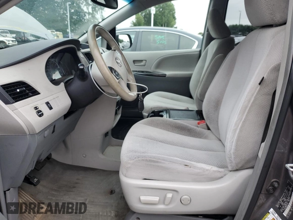 2014 Toyota Sienna LE AAS with VIN 5TDKK3DC9ES521442, listed as a Copart auction lot 64471525 with 331,395 mi miles and Salvage title. Bid and sale history available at DreamBid. Image 7.