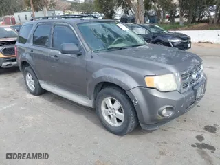 2010 Ford Escape XLT with VIN 1FMCU0D73AKC67711, listed as a IAAI auction lot 41891915 with 254,378 mi miles. Bid and sale history available at carsss.com. Image 1.