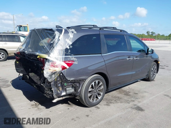 2024 Honda Odyssey EX-L with VIN 5FNRL6H65RB069145, listed as a IAAI auction lot 42120381 with 15,207 mi miles and . Bid and sale history available at DreamBid. Image 4.