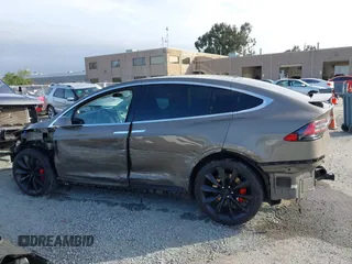 2016 Tesla Model X P90D with VIN 5YJXCAE45GF000773, listed as a IAAI auction lot 42052642 with 127,670 mi miles. Bid and sale history available at carsss.com. Image 15.