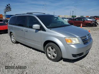 2010 Dodge Grand Caravan SXT with VIN 2D4RN5D17AR307328, listed as a Copart auction lot 49983425 with Not Provided miles and Clean Title. Bid and sale history available at DreamBid. Image 4.