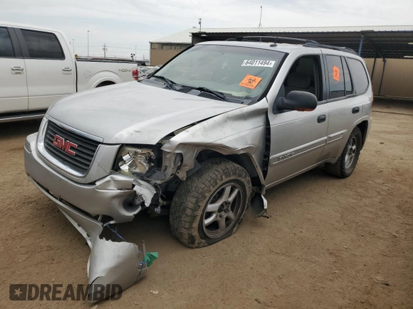 2005 GMC Envoy SLT with VIN 1GKDT13S152124404, listed as a Copart auction lot 64011494 with 212,951 mi miles and Salvage Title. Bid and sale history available at DreamBid. Image 1.