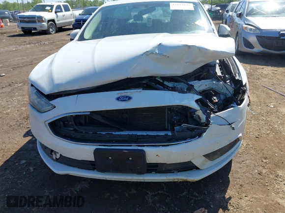 2017 Ford Fusion SE z VIN 3FA6P0H7XHR415299, wystawiony jako IAAI lot #42232634 z przebiegiem 107 962 mil mil oraz . Historia ofert i sprzedaży dostępna na DreamBid. Obrazek 6.