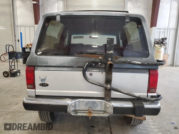 1988 Ford Bronco with VIN 1FMCU14T4JUA54161, listed as a Copart auction lot 76312054 with 34,932 mi miles and Salvage title. Bid and sale history available at DreamBid. Image 6.