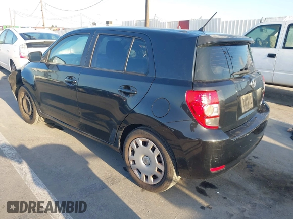 2011 Scion xD with VIN JTKKU4B46B1009909, listed as a IAAI auction lot 41959824 with 185,764 mi miles. Bid and sale history available at carsss.com. Image 3.