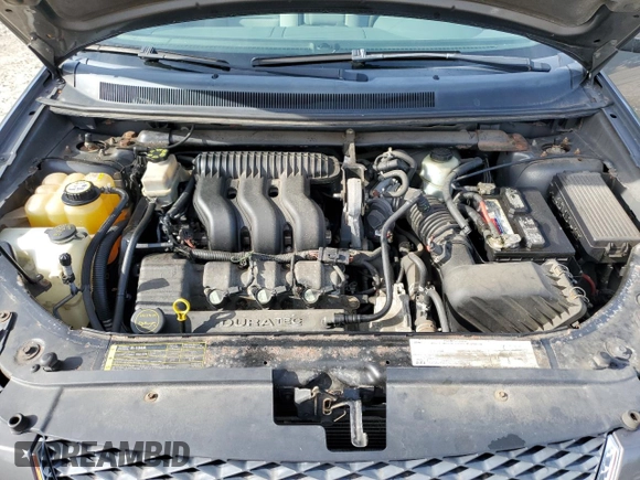 2005 Ford Freestyle SEL z VIN 1FMZK05115GA31819, wystawiony jako Copart lot #73663814 z przebiegiem Nie podano mil oraz Nie do naprawy • Non repairable. Historia ofert i sprzedaży dostępna na DreamBid. Obrazek 11.